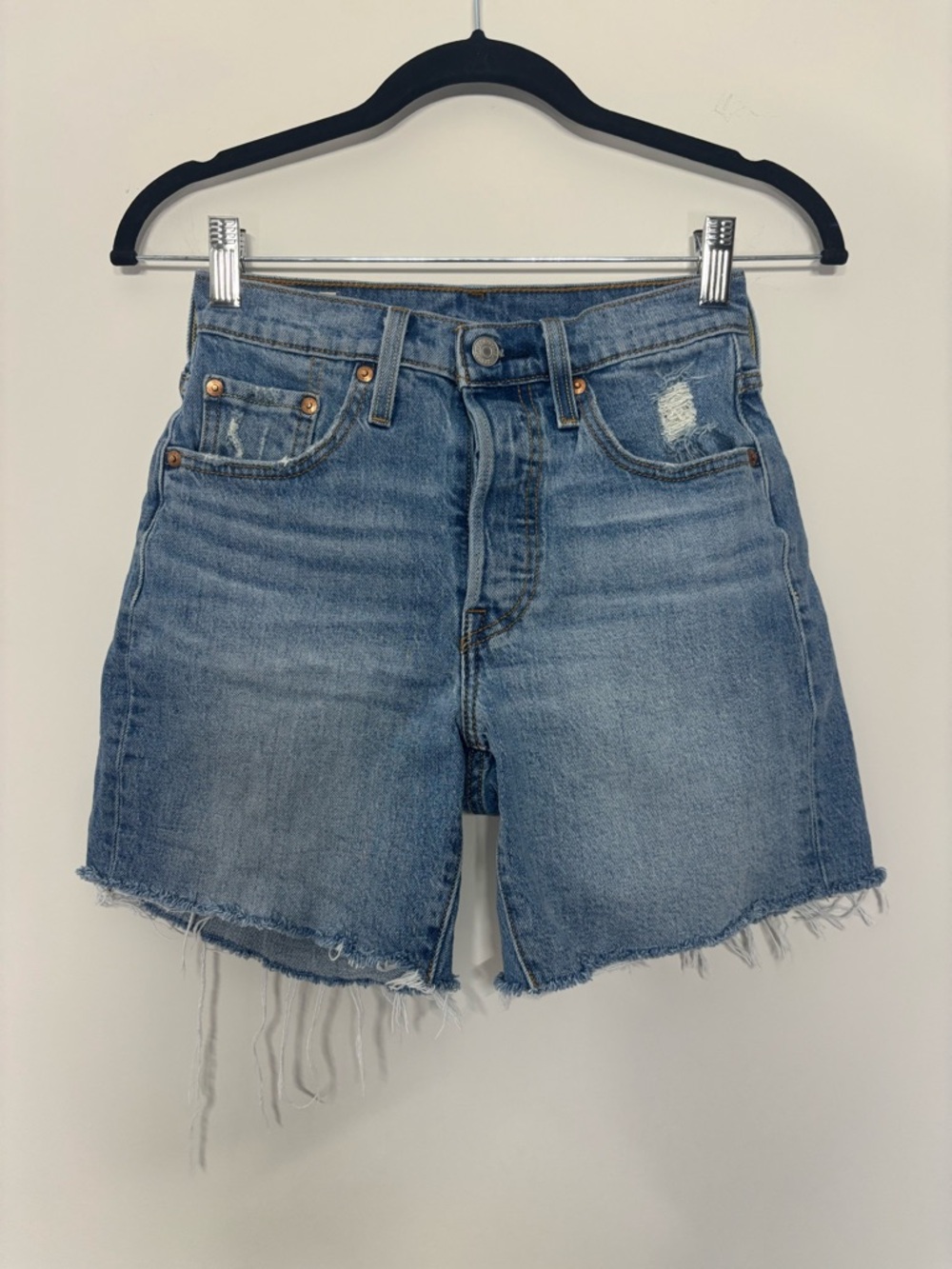 Levi's Premium 501 Original High Rise Cut Off Denim Shorts in Light Wash